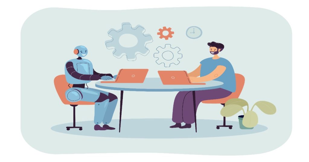 A human seated with a robot to represent AI at a table with laptops, to represent involvement of AI in video production.