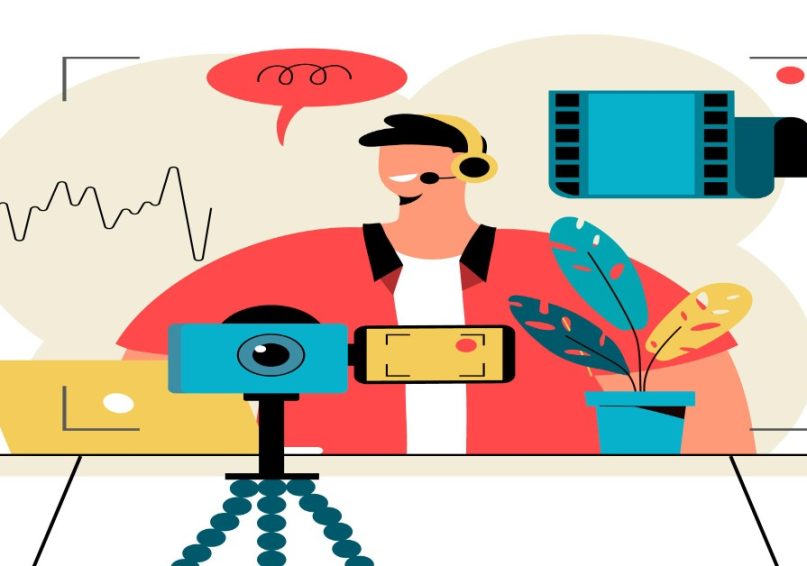 Tools for Remote Video Production A man operates a video camera and holds a microphone, illustrating remote video production.